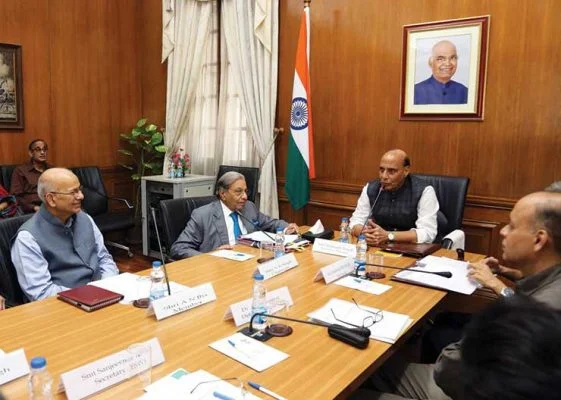 NK-Singh-with-Rajnath-15th-Commission-561x400 (1)