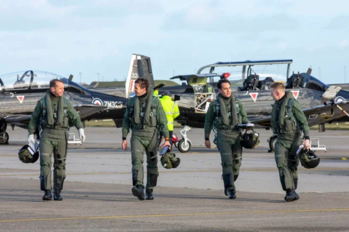 RAF-flight-instructors-and-cadets-after-a-training-flight_credit-pic_UK-MoD-Crown-scaled-e1636383784296