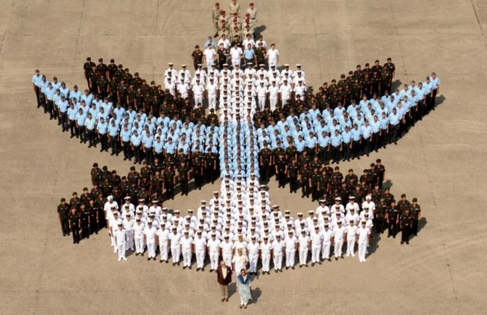 Nirmala_Sitharaman_at_the_head_of_the_ANC_crest_along_with_the_Lieutenant_Governor_of_Andaman_and_Nicobar_Islands_Admiral_Retd._D.K._Joshi_and_the_Commander-in-Chief_Andaman__Nicobar_Command