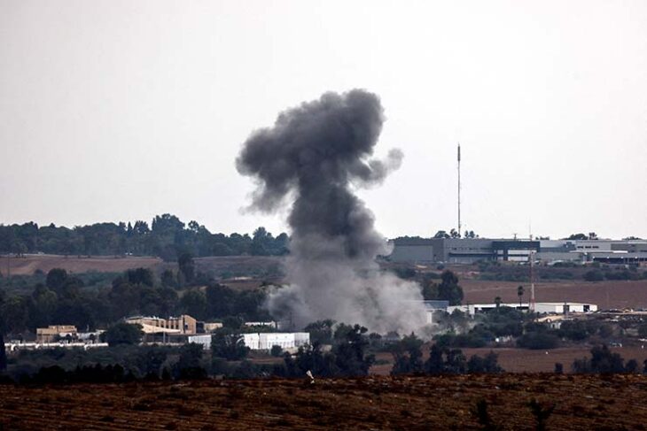 FILE PHOTO: A rocket launched from the Gaza Strip strikes an area near Sderot, southern Israel