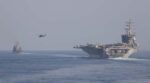 The Eisenhower Carrier Strike Group Transits the Strait of Hormuz