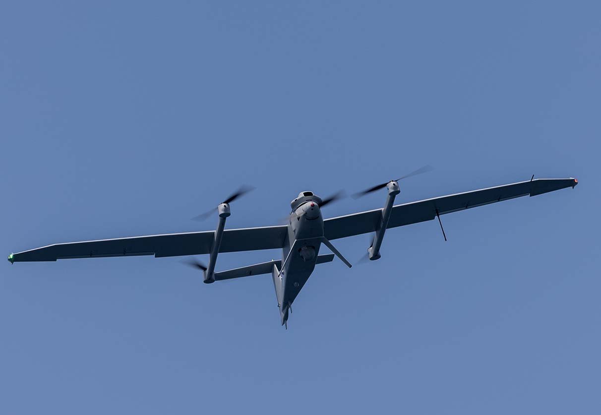 A Jump 20 group 3 Unmanned Aerial System conducts a flight during Amphibious Ready Group Marine Expeditionary Unit exercise (ARGMEUEX), aboard the San Antonio-class amphibious transport dock ship USS San Antonio (LPD 17), Iwo Jima Amphibious Ready Group (IWOARG), while underway in the Atlantic Ocean, May 15, 2025. During ARGMEUEX, the 22nd MEU, aboard IWOARG shipping, conducts training in support of various mission essential tasks that enhance operational readiness and lethality as a unified IWOARG/22 MEU team. (U.S. Marine Corps photo by Lance Cpl. Kyle Baskin)