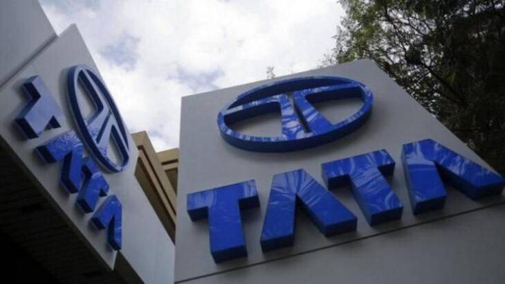 Tata Motors logos are seen at their flagship showroom before the announcement of their Q3 results in Mumbai